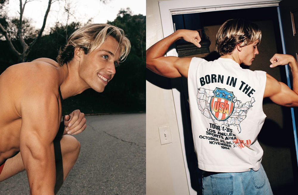 Young man showing off his muscles and a graphic tee shirt.